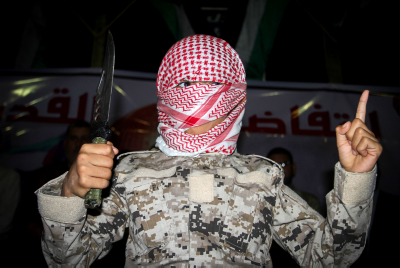 Palestinian supporters of Hamas and Islamic Jihad movement take part in a protest to support the third Palestinian uprising, in Rafah in the southern Gaza Strip, on November 13, 2015. Photo by Abed Rahim Khatib/ Flash90