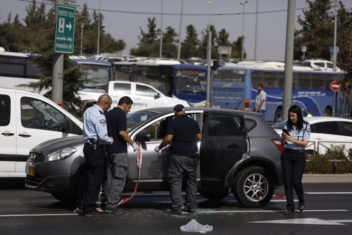 Police at a scene of a terror attack at the National Police Headquarters in Jerusalem on October 9, 2016. A Palestinian man drove by and shot civilians injuring about g people before being shot by police when he got to the Sheikh Jarah neighborhood in Jerusalem. Photo by Hadas Parush/Flash90 *** Local Caption *** ????? ??? ???????