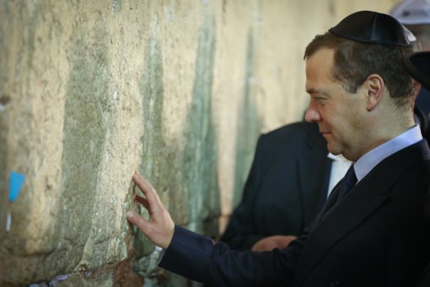 Prime Minister of Russia Dmitry Medvedev, touches the Western Wall in Jerusalem Old City on November 10, 2016. Photo by Shlomi Cohen/Flash90 *** Local Caption *** ??? ????? ????? ?? ????? ?????? ????? ????? ???? ??? ????? ?????